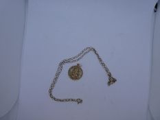 9K yellow gold neck chain marked 9K together with a 9ct yellow gold St Christopher marked 375, gross