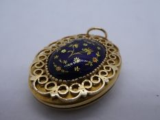 9ct yellow gold Victorian style locket with blue enameled floral decorated panel, marked 9, 18.9g, a