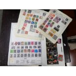 A small tray of world stamps