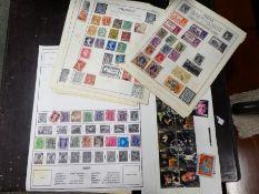 A small tray of world stamps