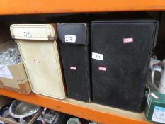 Three cases containing LPs