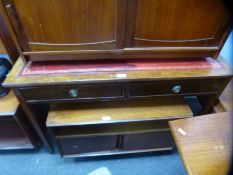 A vintage red leather top two drawer top desk