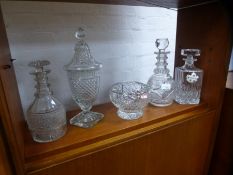 Four crystal decanters and a signed posy bowl