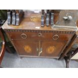 A mahogany Edwardian inlaid chest with a drawer and cupboards, nest of three coffee tables, small dr