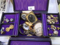 An interesting box of costume and other items including miniatures, portrait charms, buttons etc