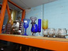 A collection of coloured glass vases