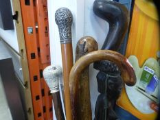 A small quantity of walking sticks including an African Tribal carved etc