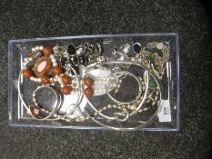 A collection of silver and other costume jewellery including a bangle, pendant, chokers, etc