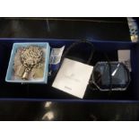 Boxed Swarovski fashion necklace, silver charm bracelet and two silver 'Annie' brooches