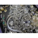 A tray of modern silver jewellery including neck chains, earrings, brooches, etc