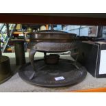 A Middle Eastern copper three legged pan warmer and a tray