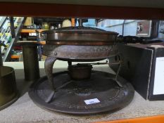 A Middle Eastern copper three legged pan warmer and a tray