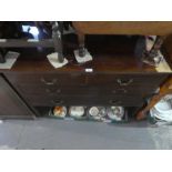 A mahogany dressing chest with two short drawers over two long drawers