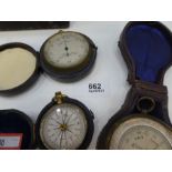 Leather cased compass and two pocket weather gauges, one by T B Winter