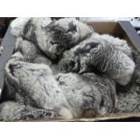 Two boxes of mixed fur clothing items