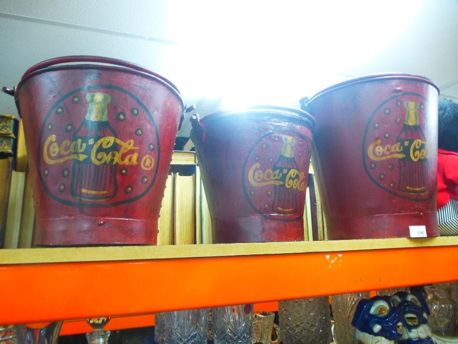 3 Graduated Coca Cola buckets