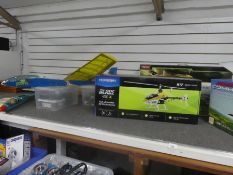 A collection of boxed and unboxed model gliders, helicopters etc and two boxes of remote controls ap