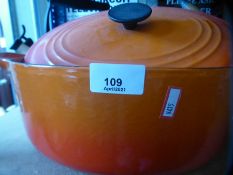 Large orange oval Le Creuset pot, set of five pans with lids and white Le Creuset kettle