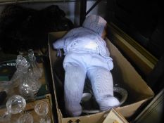 A box of mixed china and glass and a vintage doll