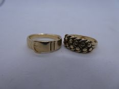 9ct yellow gold buckle design ring and a 9ct yellow gold keeper ring, both marked 375, total weight