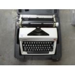 Vintage cased Olympia Monica typewriter