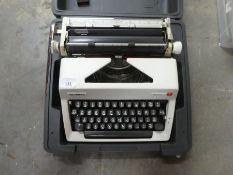 Vintage cased Olympia Monica typewriter