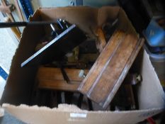 A box of vintage wooden planes