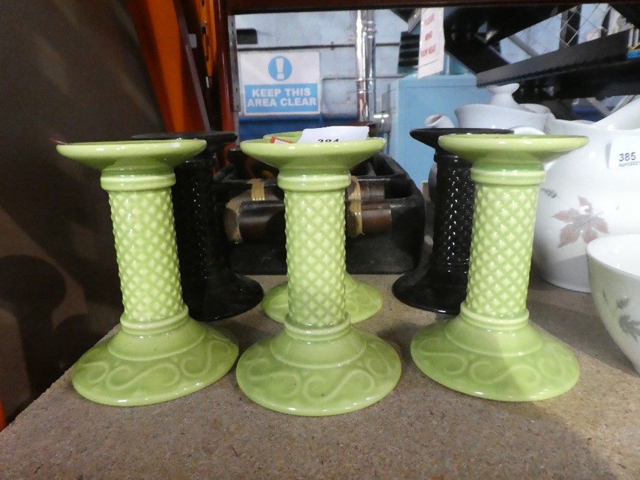 6 Painted pillar candle holders and wooden serving bowls
