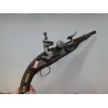 An antique ottoman flintlock pistol with ornamental bone inserts