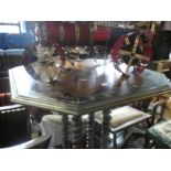 A Victorian inlaid coffee table on barley twist supports