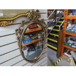 Oval French style bevelled wall mirror