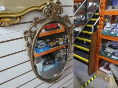 Oval French style bevelled wall mirror