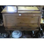 A wax pine bureau by Jaycee