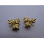 Pair of 18ct yellow gold leaf design clip on earrings, marked 750, gross weight 6.1g