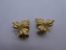 Pair of 18ct yellow gold leaf design clip on earrings, marked 750, gross weight 6.1g