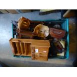 A crate of collectables including apprentice's wooden model of a dresser, carved treen, iron etc