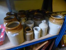 A quantity of stoneware jars and similar