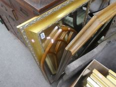 A large rectangular gilt frame bevel wall mirror and two others and a brass standard lamp