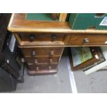 Victorian mahogany pedestal desk with green leather top above nine drawers