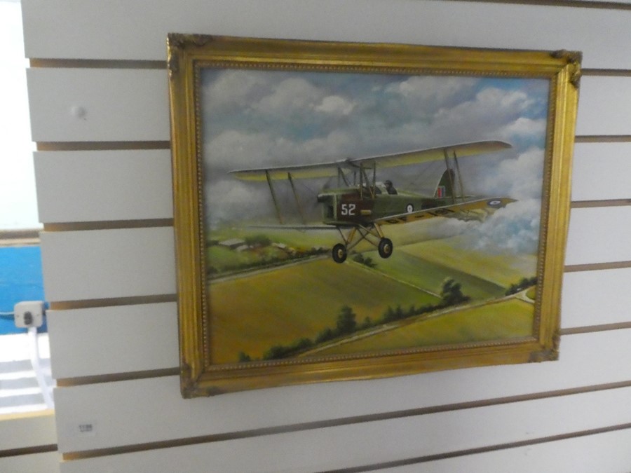 Gilt framed oil on board painting Ernest C Wilbraham depicting military aircraft