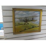 Gilt framed oil on board painting Ernest C Wilbraham depicting military aircraft