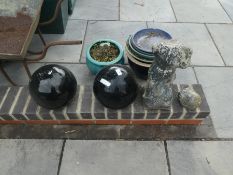 Two painted terracotta black balls and a stone effect statue A/F