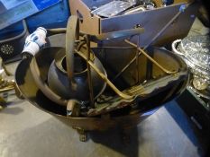 A vintage brass coal bucket with lion paw feet etc