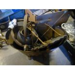 A vintage brass coal bucket with lion paw feet etc