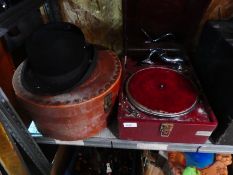A vintage HMV wind up gramophone, with bowler hat, case and a picture of Wickham fair etc