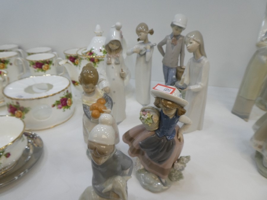Six Lladro figure and a Nao boy with cap - Image 2 of 2