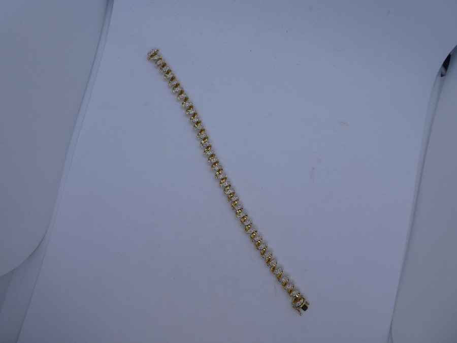 Pretty 18ct yellow gold spiral design bracelet inset with diamond chips on each spiral, approx 18cm, - Image 2 of 3