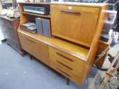 A 1970's teak sideboard with raised back on turned legs, 150 cms