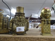 Selection of brass money boxes depicting Humpty Dumpty etc and an oil lamp
