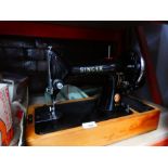 Hand cranked Singer sewing machine